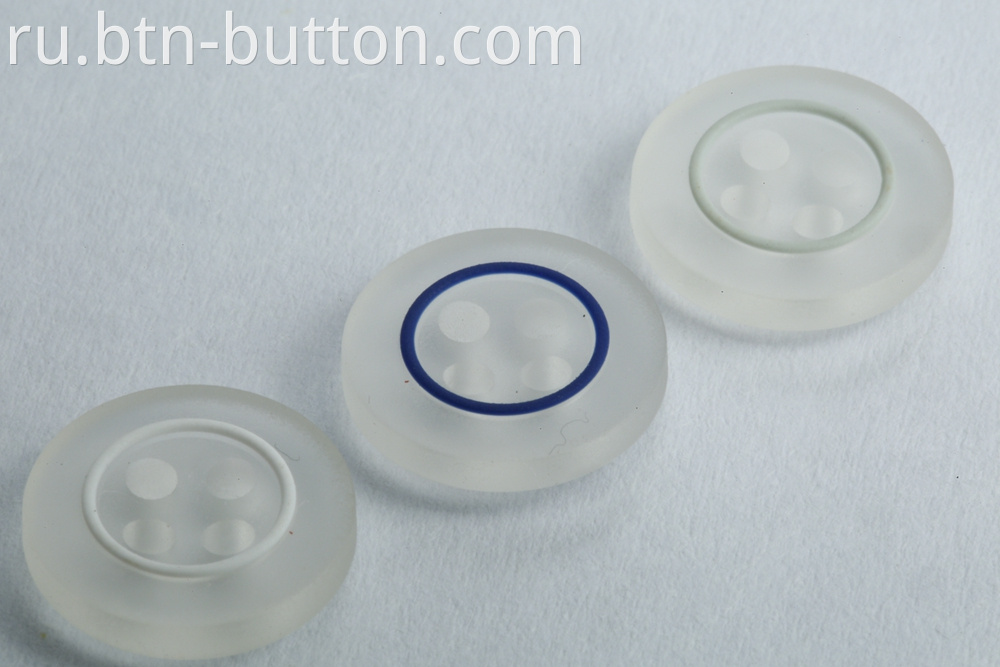 Colored eyelet transparent resin button